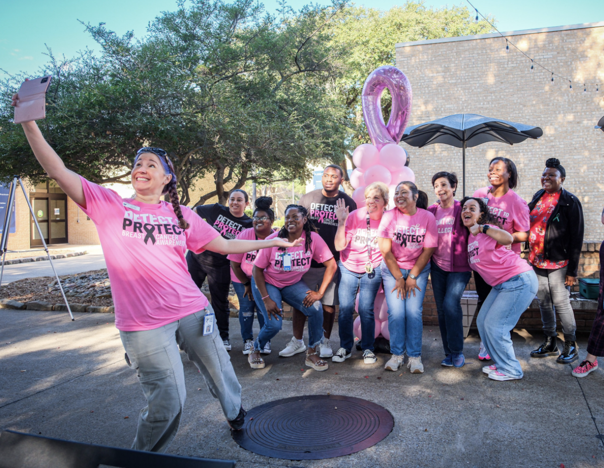 Student development associate Austin McCabe takes a selfie with different members of TCC health services and other NE Campus community members after the Detect to Protect event. The event was to help teach how to detect cancer early.